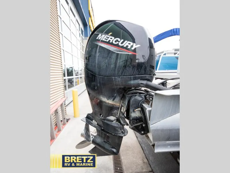 Slide: The Image of Mercury outboard motor on a 2023 Sport 85 - 25 FT boat at Bretz RV & Marine. - 8