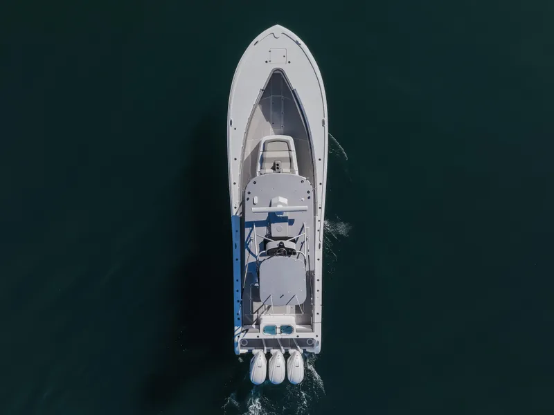 Slide: The Image of Overhead view of 2019 Buddy Davis 42 CC boat on water. - 12