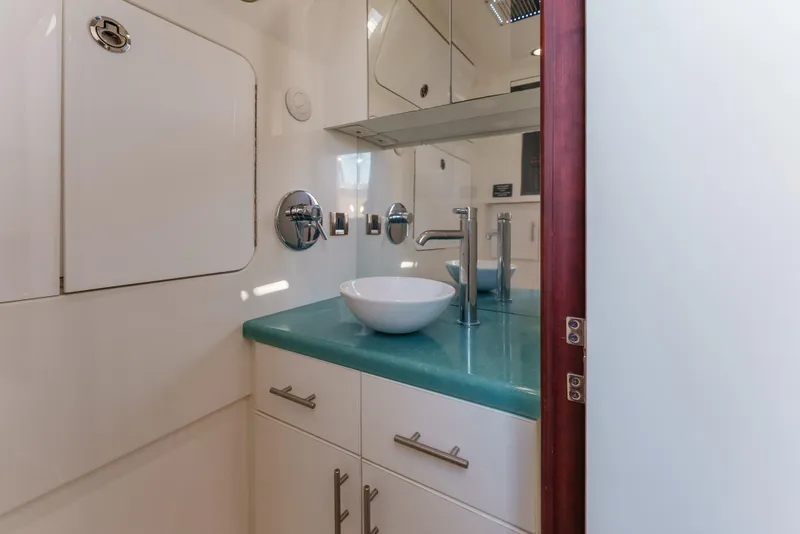 Slide: The Image of Luxurious bathroom interior of 2019 Buddy Davis 42 CC boat with modern fixtures. - 32