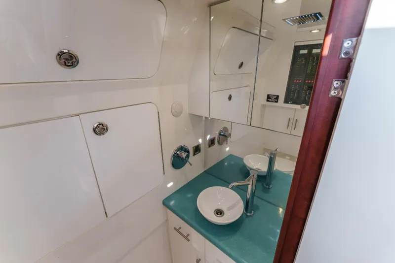 Slide: The Image of Luxurious bathroom in 2019 Buddy Davis 42 CC yacht with modern fixtures and sleek design. - 33