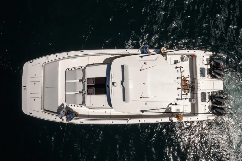 Slide: The Image of Aerial view of 2024 Aquila 47 Molokai boat on water. - 14