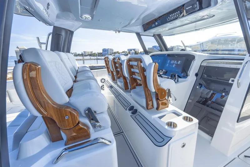 Slide: The Image of Interior of 2024 Aquila 47 Molokai boat with luxurious seating and advanced navigation systems. - 16