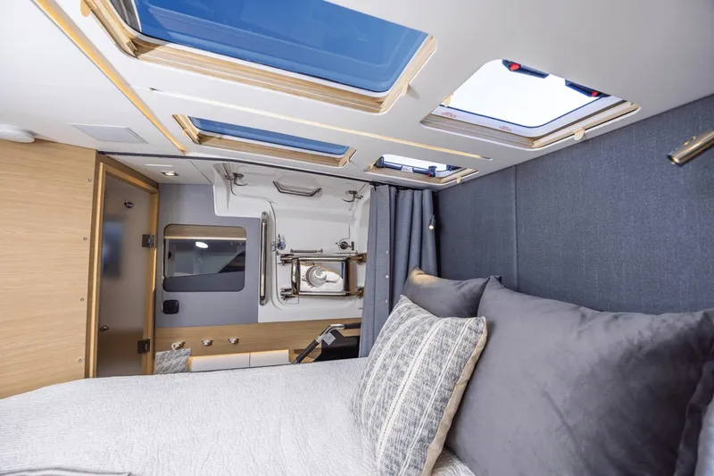 Slide: The Image of Interior cabin of 2024 Aquila 47 Molokai with skylights and modern furnishings. - 20