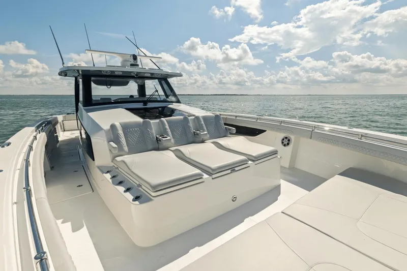 Slide: The Image of 2024 Aquila 47 Molokai luxury yacht with spacious deck and comfortable seating. - 7