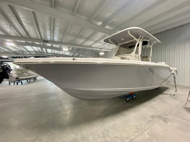 Slide: The Image of 2024 Key West 263 FS boat in indoor storage facility. - 1