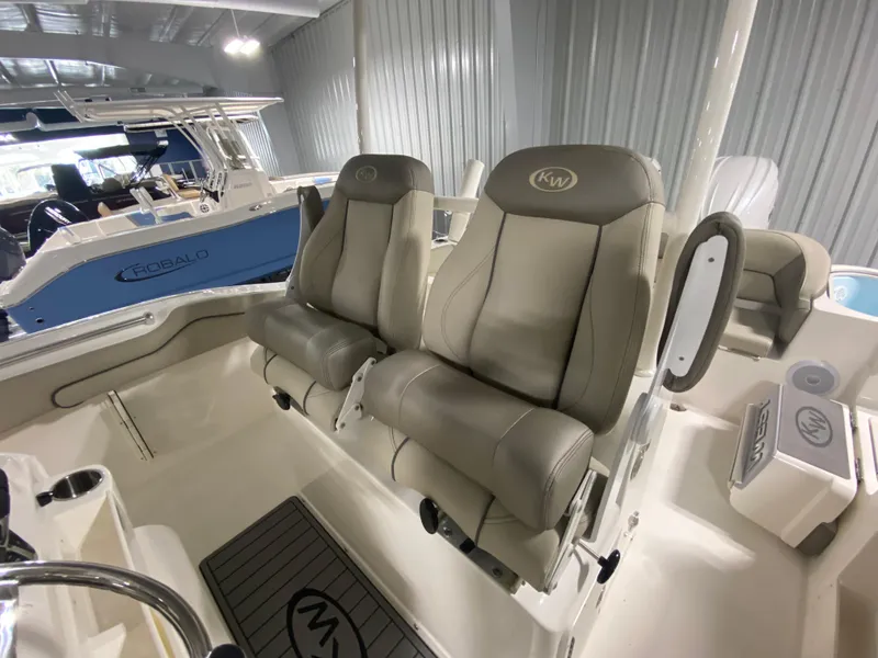 Slide: The Image of 2024 Key West 263 FS boat interior with dual captain's chairs. - 15