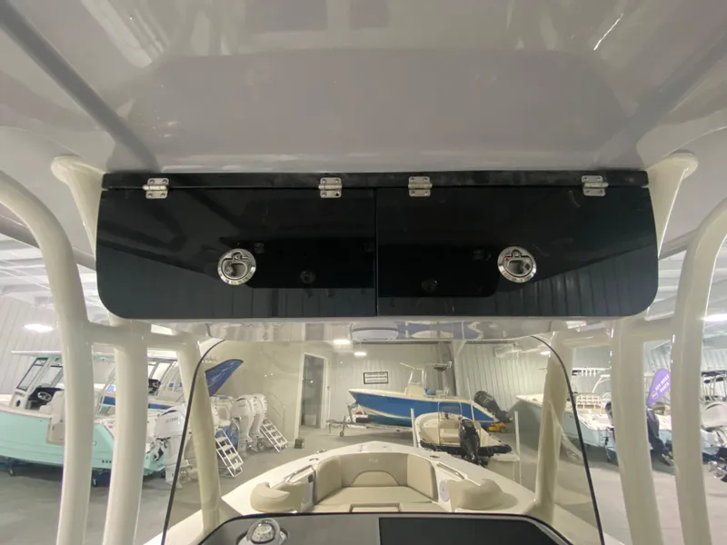 Slide: The Image of 2024 Key West 263 FS boat interior with storage compartments. - 18