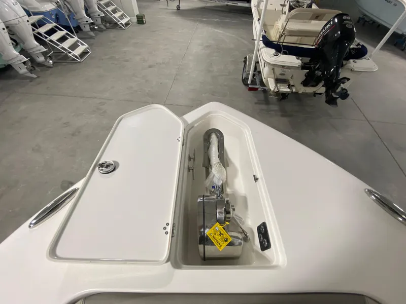Slide: The Image of 2024 Key West 263 FS boat anchor compartment in showroom. - 28