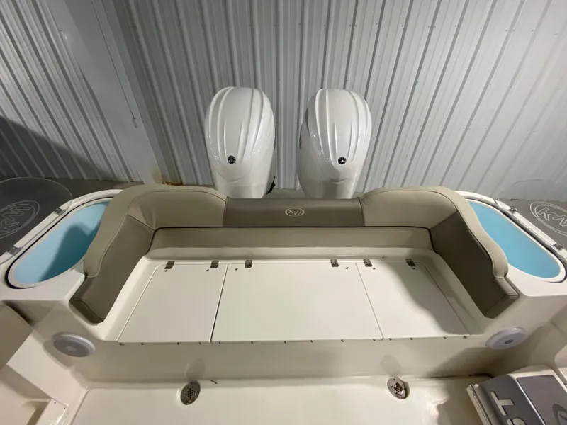 Slide: The Image of 2024 Key West 263 FS boat with dual outboard motors and rear seating. - 7