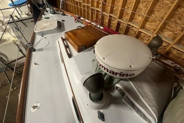 Slide: The Image of 1966 Tripp 31 Masthead Sloop deck with navigation equipment in storage. - 17