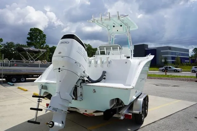 Slide: The Image of 2024 Cape Horn 22OS boat with powerful outboard motor on trailer. - 22