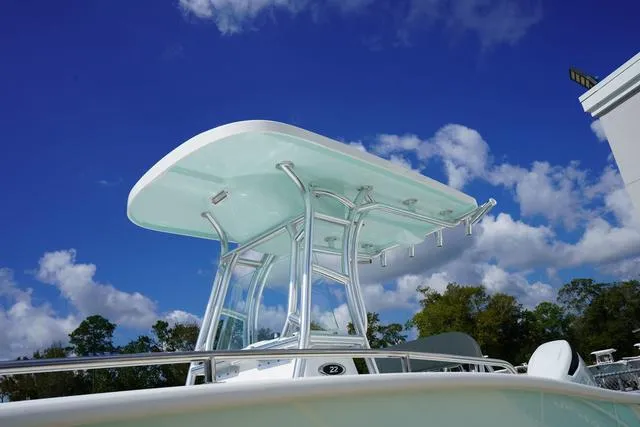 Slide: The Image of 2024 Cape Horn 22OS boat against a blue sky with clouds. - 27