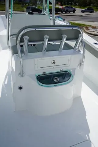 Slide: The Image of 2024 Cape Horn 22OS boat interior with rod holders and storage. - 31