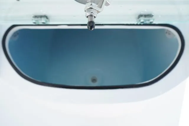 Slide: The Image of 2024 Cape Horn 22OS livewell with water inlet. - 35