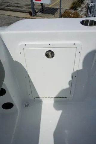 Slide: The Image of 2024 Cape Horn 22OS boat interior storage compartment. - 37