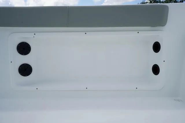 Slide: The Image of 2024 Cape Horn 22OS boat interior storage compartment with ventilation ports. - 39