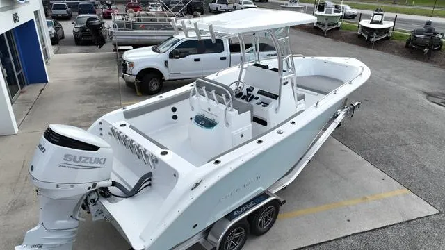 Slide: The Image of 2024 Cape Horn 22OS boat with Suzuki outboard motor on trailer. - 4