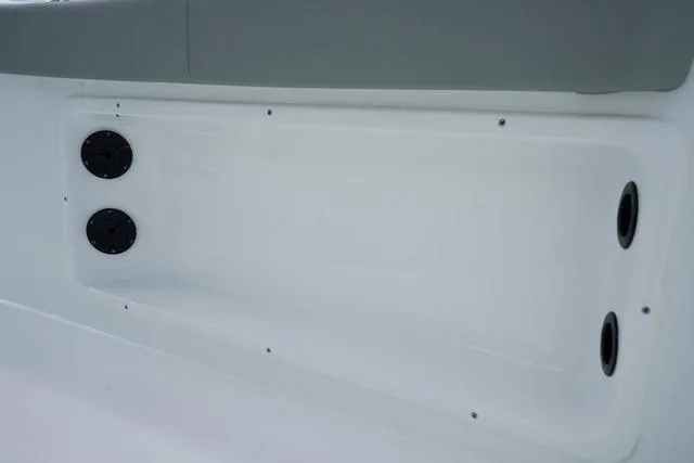 Slide: The Image of 2024 Cape Horn 22OS boat interior storage compartment with ventilation ports. - 40