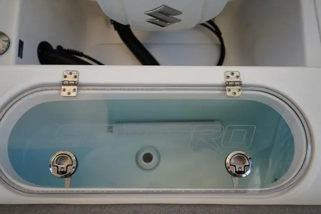 Slide: The Image of Livewell of 2024 Sea Pro 222 CC boat with clear lid and dual latches. - 5