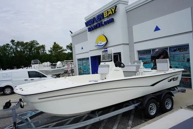 Slide: The Image of 2023 Mako 19 Pro Skiff boat on trailer at Waylen Bay Marine dealership. - 25
