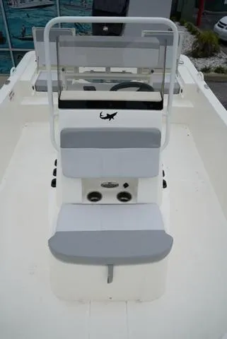 Slide: The Image of 2023 Mako 19 Pro Skiff boat interior with seating and console. - 44