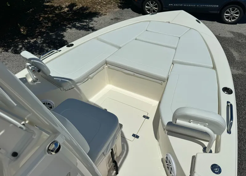 Slide: The Image of 2025 Pathfinder 2200 TRS boat with spacious seating and sleek design. - 3