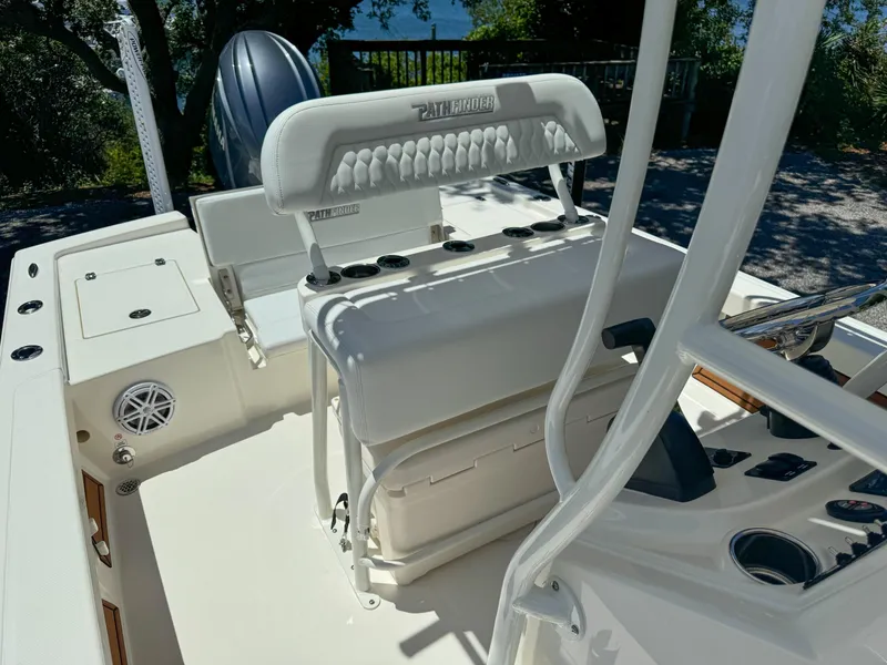 Slide: The Image of 2025 Pathfinder 2200 TRS boat interior with seating and console features. - 5