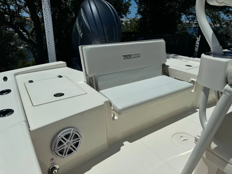Slide: The Image of 2025 Pathfinder 2200 TRS boat interior with seating and Yamaha engine. - 6
