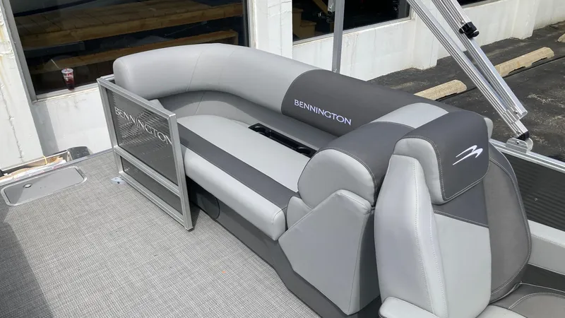 Slide: The Image of 2024 Bennington 22 SVSR pontoon boat with gray and black seating. - 3