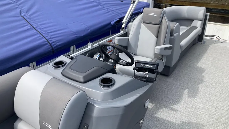 Slide: The Image of 2024 Bennington 22 SVSR pontoon boat interior with Garmin navigation system. - 5