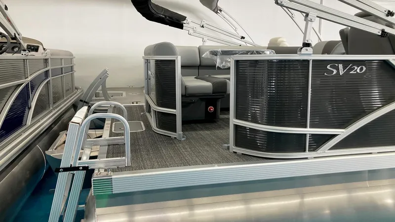 Slide: The Image of 2024 Bennington 20 SVL pontoon boat with seating and entry ladder. - 2