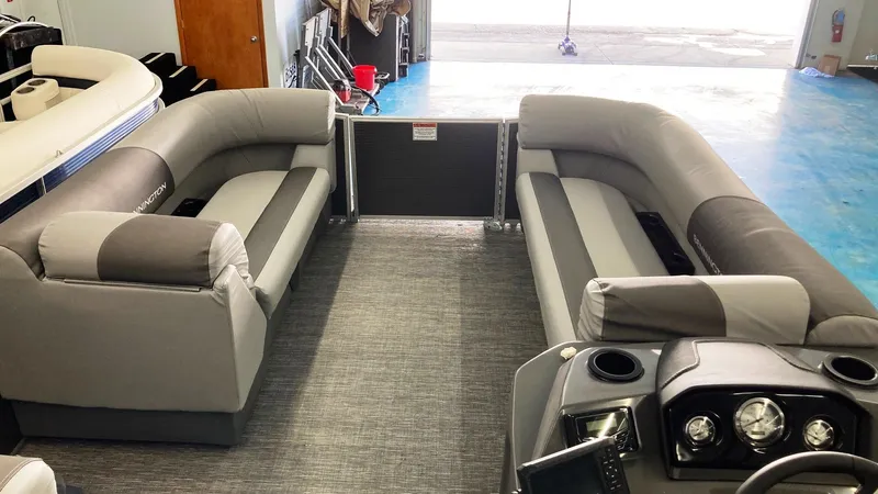 Slide: The Image of 2024 Bennington 20 SVL pontoon boat interior with gray seating. - 5