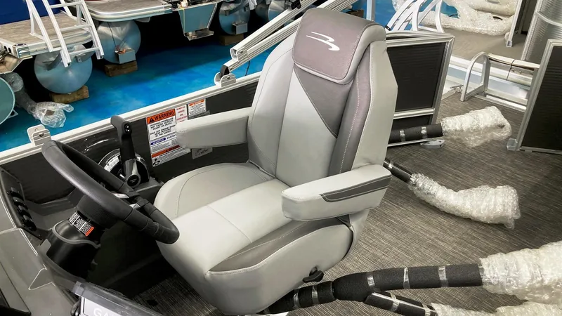 Slide: The Image of 2024 Bennington 20 SVL boat captain's chair and helm station. - 6