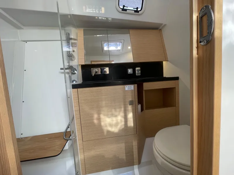Slide: The Image of Modern bathroom interior of 2024 Hanse 410 yacht with wood accents and sleek fixtures. - 22