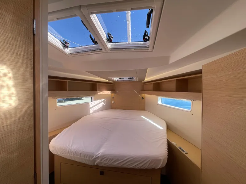 Slide: The Image of Luxurious cabin interior of 2024 Hanse 410 yacht with skylights and modern design. - 28