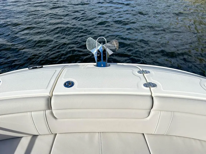 Slide: The Image of 2023 Sea Ray SDX 290 Outboard boat stern with anchor, on water. - 10