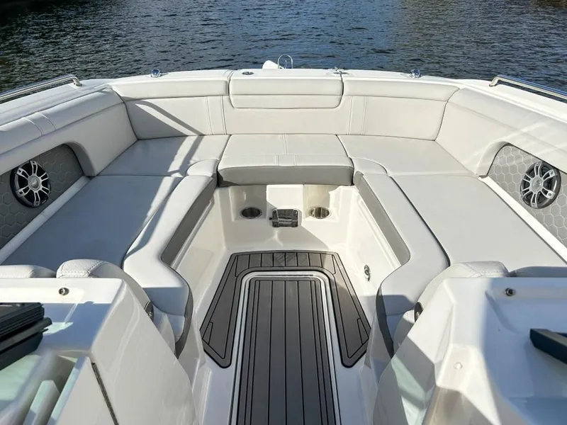 Slide: The Image of 2023 Sea Ray SDX 290 Outboard boat interior with spacious seating and water view. - 12