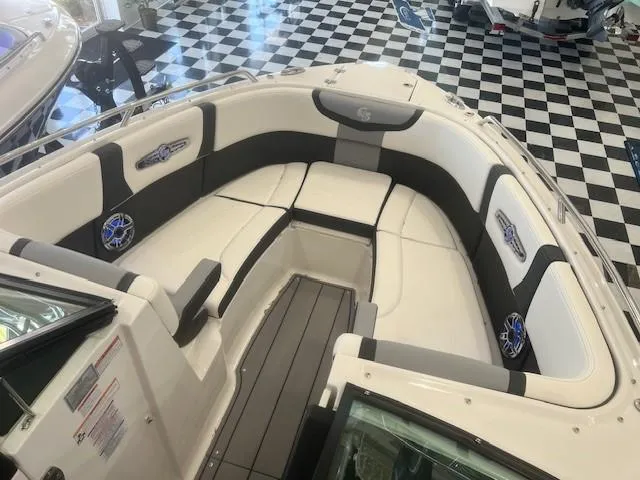 Slide: The Image of Interior view of 2024 Chaparral 26 Surf boat with luxurious seating. - 8