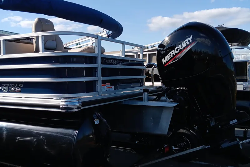 Slide: The Image of 2024 Ranger Reata 220FC pontoon boat with Mercury outboard motor. - 5