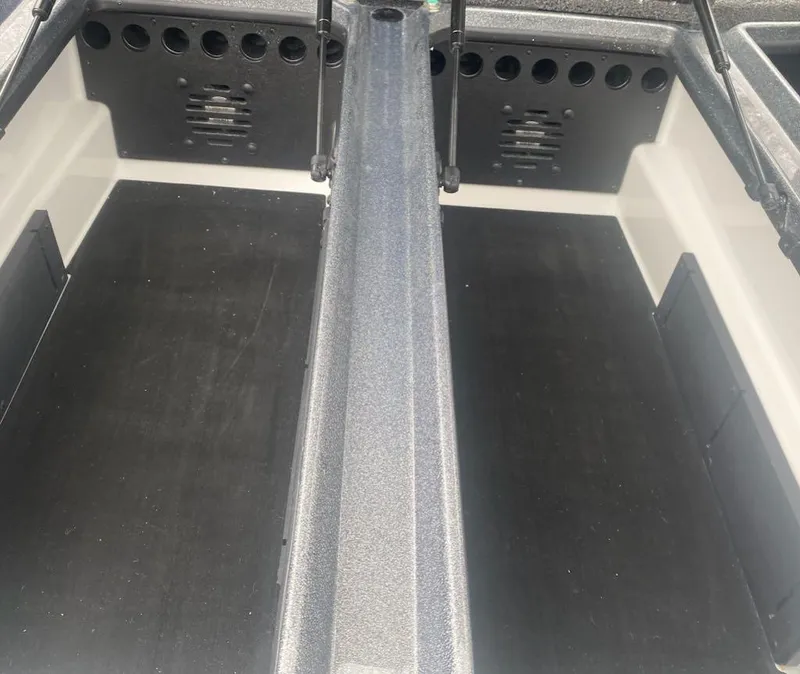 Slide: The Image of 2024 Nitro Z21 XL Pro boat interior storage compartments. - 11