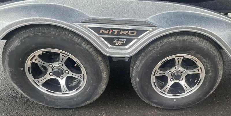 Slide: The Image of 2024 Nitro Z21 XL Pro trailer wheels and fender. - 15