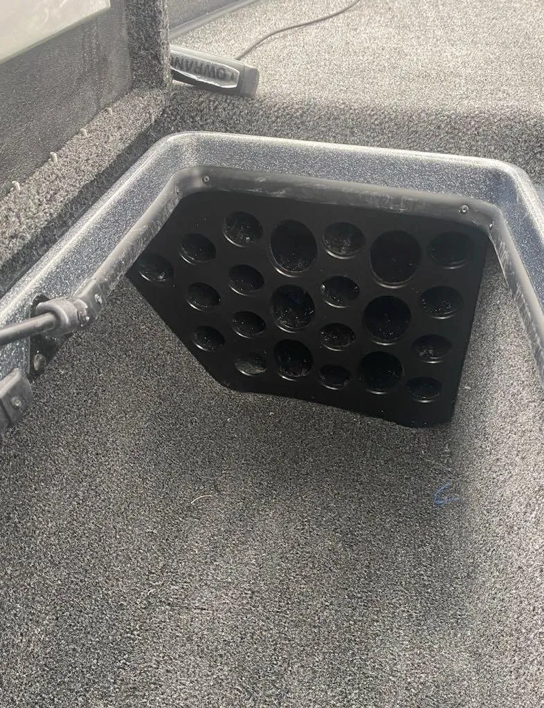 Slide: The Image of 2024 Nitro Z21 XL Pro boat interior with rod holder. - 18