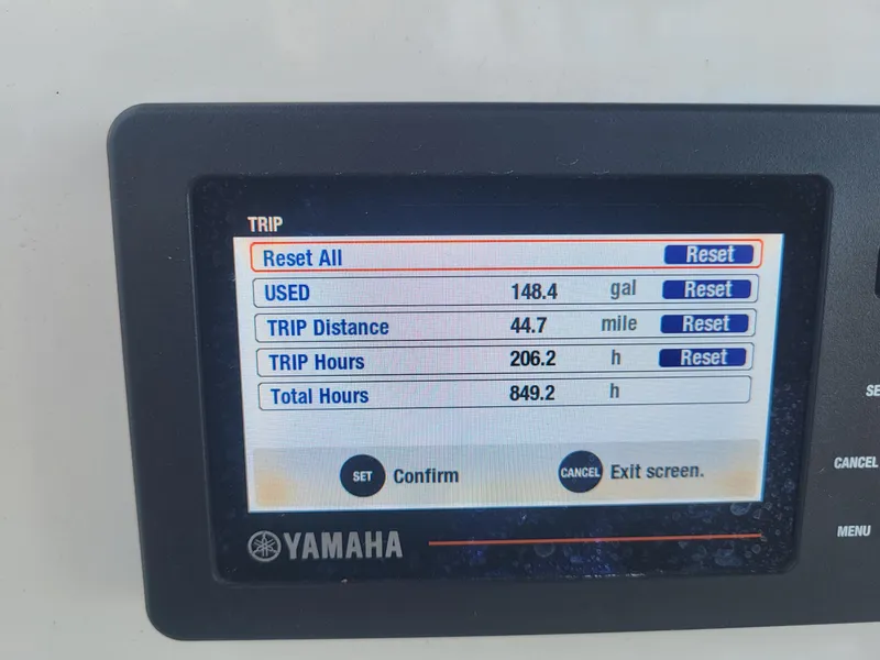 Slide: The Image of Yamaha display showing trip data on a 2021 NauticStar 2302 Legacy boat. - 13
