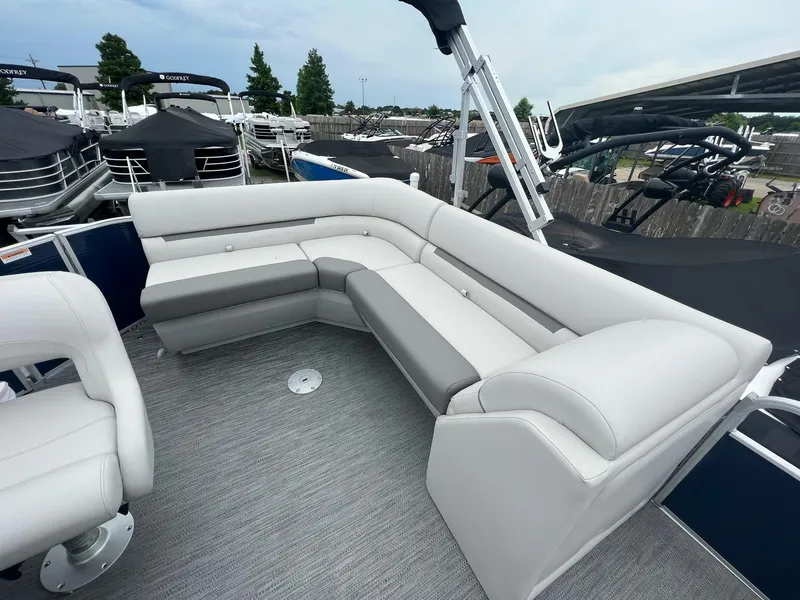 Slide: The Image of 2023 Godfrey Sweetwater Xperience 1680 CX pontoon boat interior with gray seating. - 10