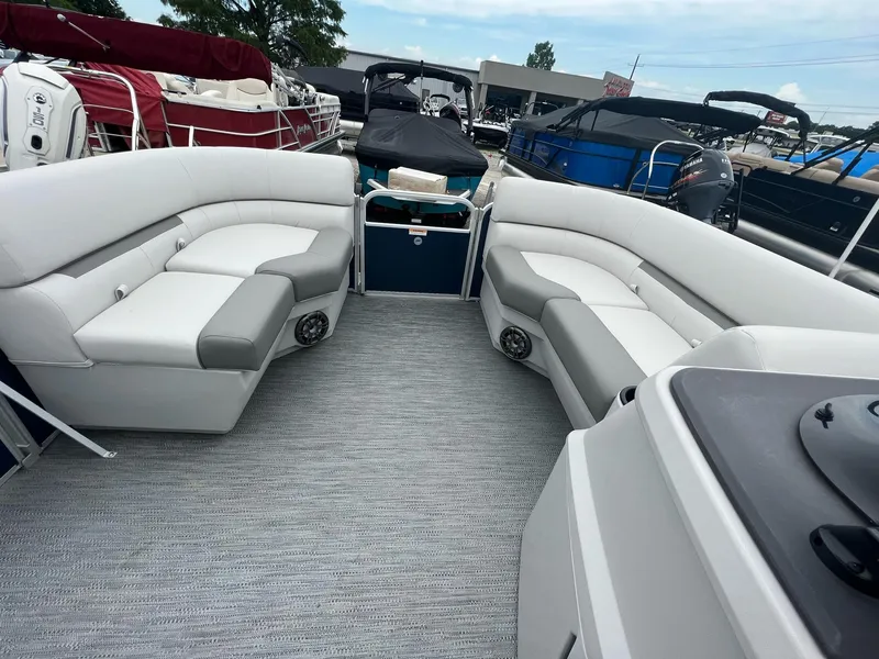 Slide: The Image of 2023 Godfrey Sweetwater Xperience 1680 CX pontoon boat interior with spacious seating. - 13