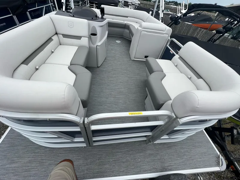 Slide: The Image of 2023 Godfrey Sweetwater Xperience 1680 CX pontoon boat interior with spacious seating. - 9