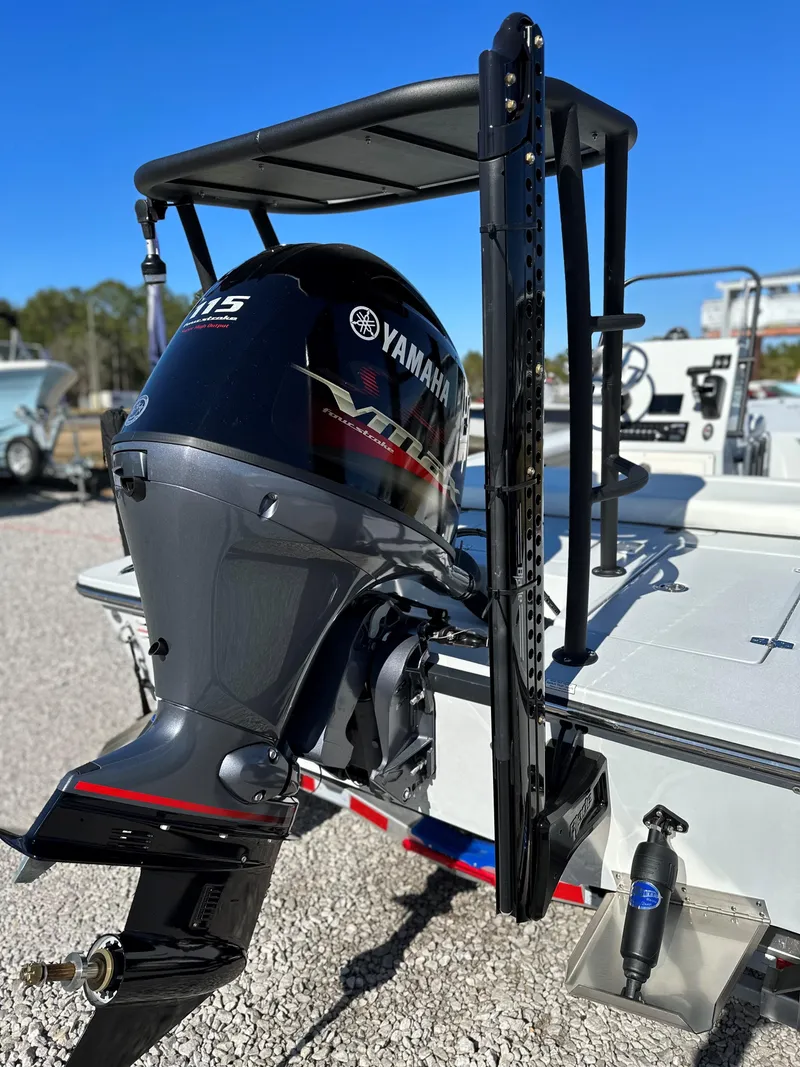 Slide: The Image of 2024 Hewes 18 Redfisher boat with Yamaha outboard motor. - 5
