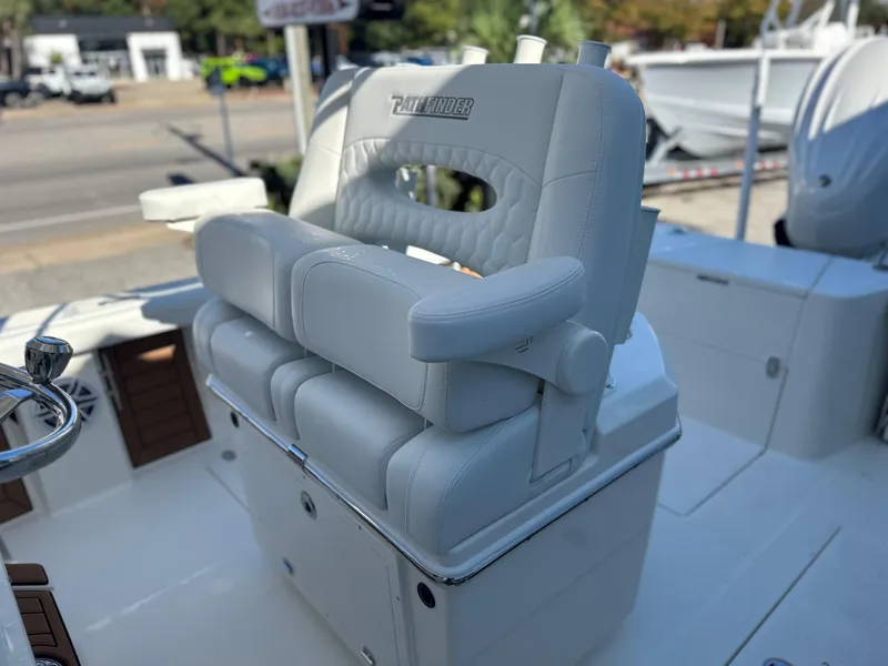 Slide: The Image of 2025 Pathfinder 2400 Open boat with white cushioned seating. - 20