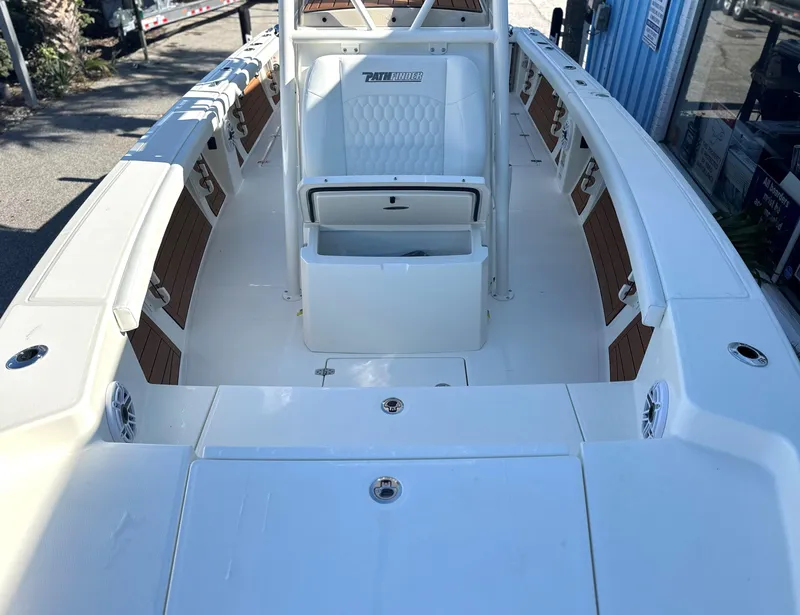 Slide: The Image of 2025 Pathfinder 2400 Open boat interior with seating and storage compartments. - 22