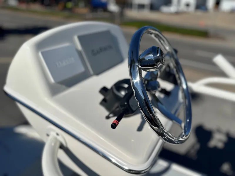 Slide: The Image of Steering console of 2025 Pathfinder 2400 Open boat with modern controls. - 26
